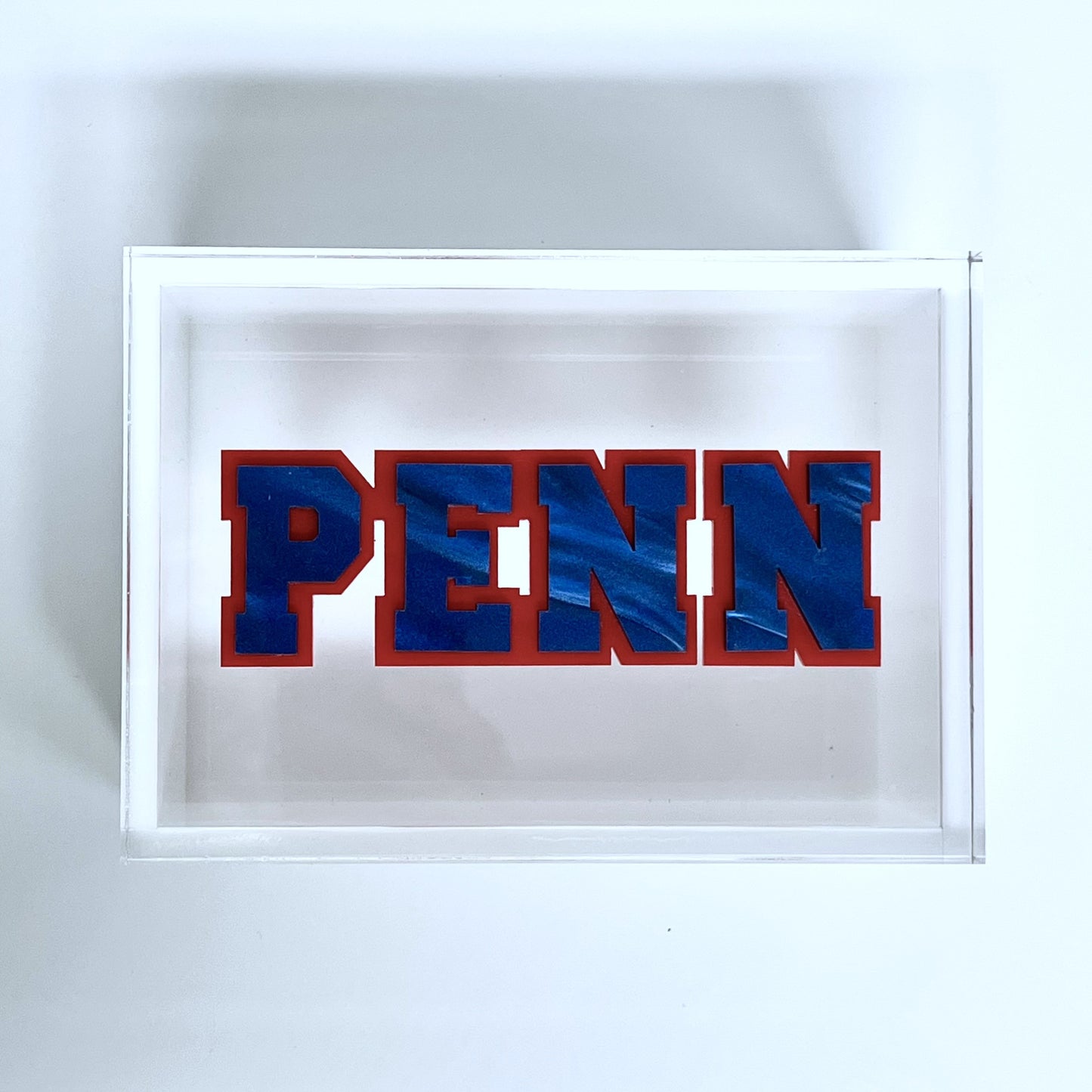 Blue 'PENN' logo