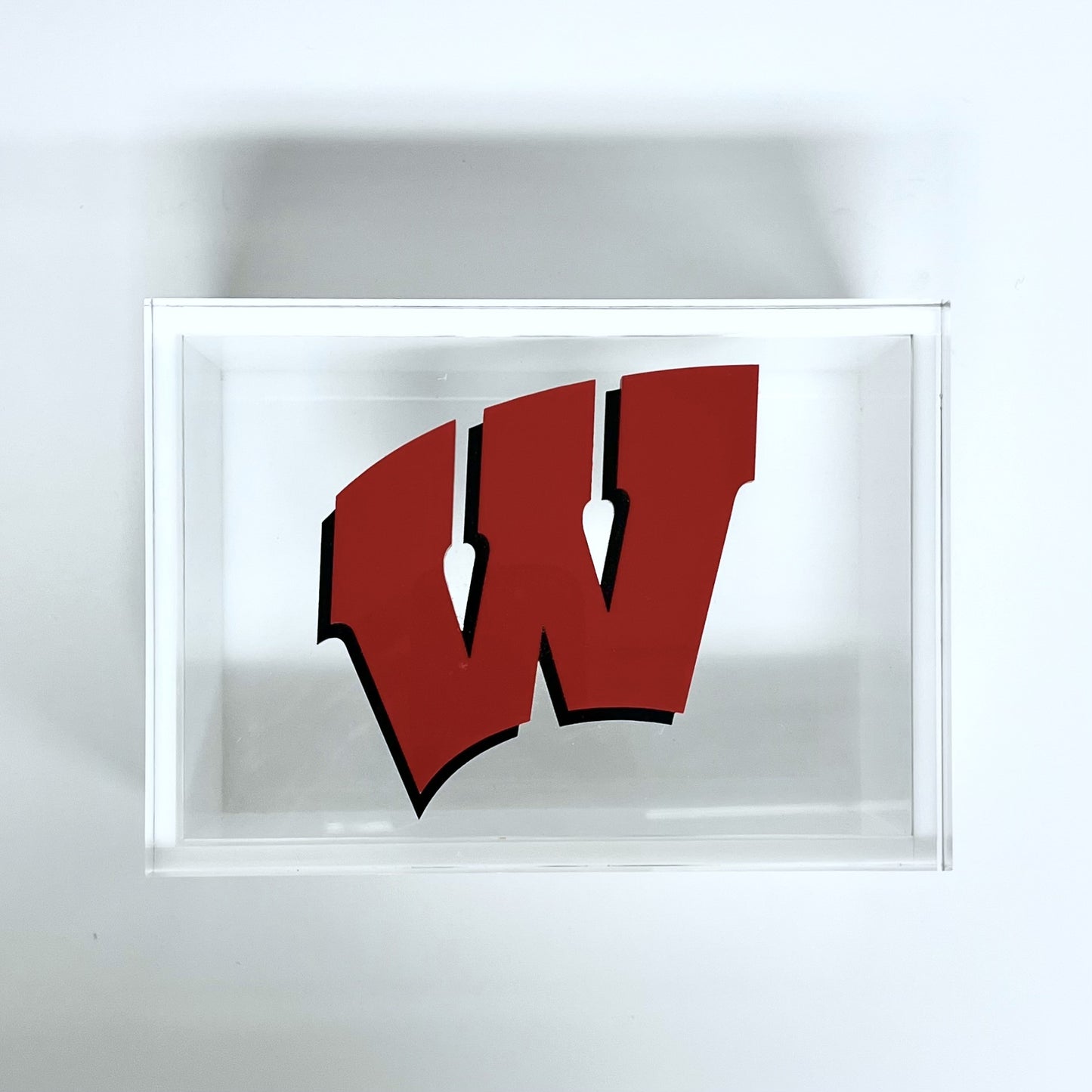Red 'W' logo with framed artboard