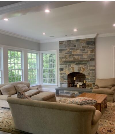 Living room with stone fireplace